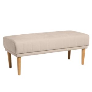 wohnli-moebel-suche-M23165018 Wohnli Möbelsuche - Gepolsterter Hocker mit stabilen Holzbeinen in Beige.